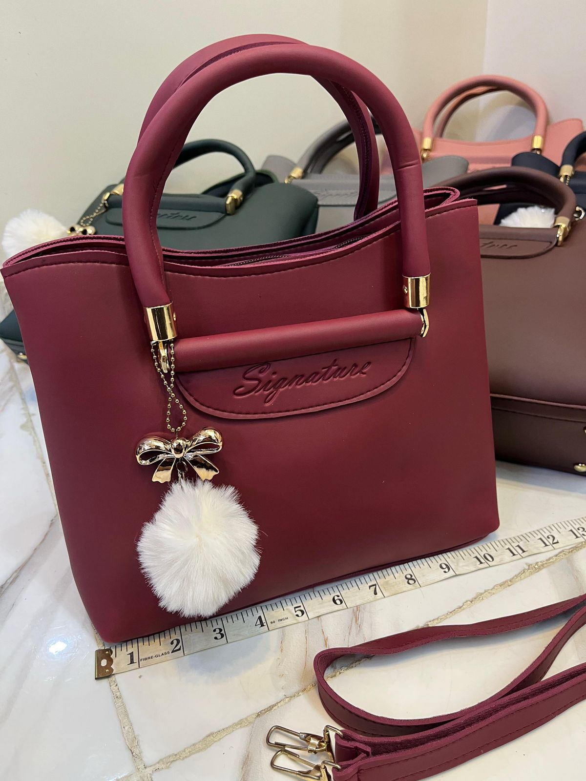 Signature Shoulder Bag