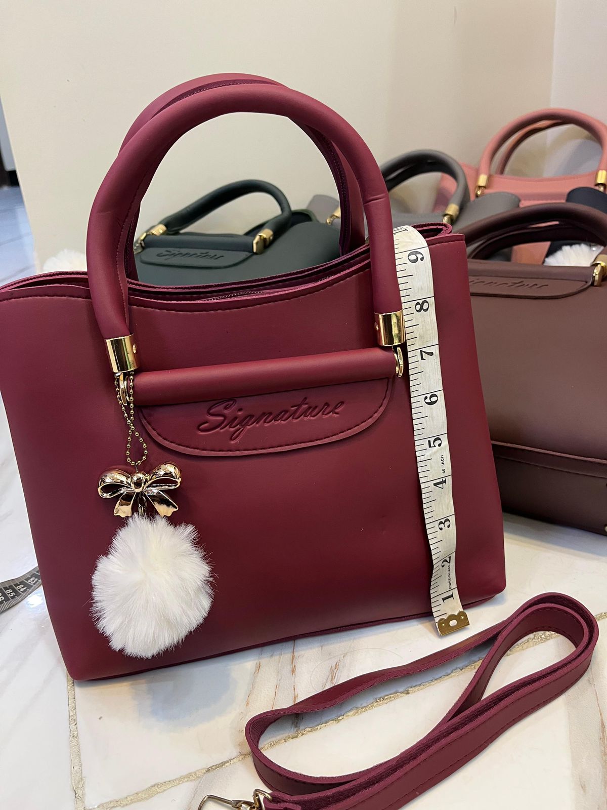 Signature Shoulder Bag